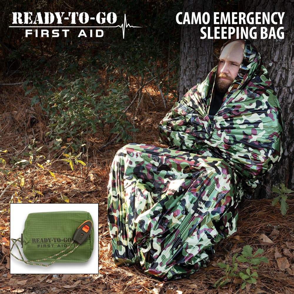 Full image of a person in the Ready-To-Go First Aid Camo Emergency Sleeping Bag. image number 0